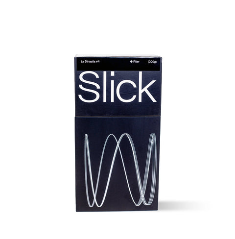 La Dinastía Colombian Gesha coffee pack by Slick Coffee Co. with floral notes of jasmine, bergamot, lemongrass, and cardamom.