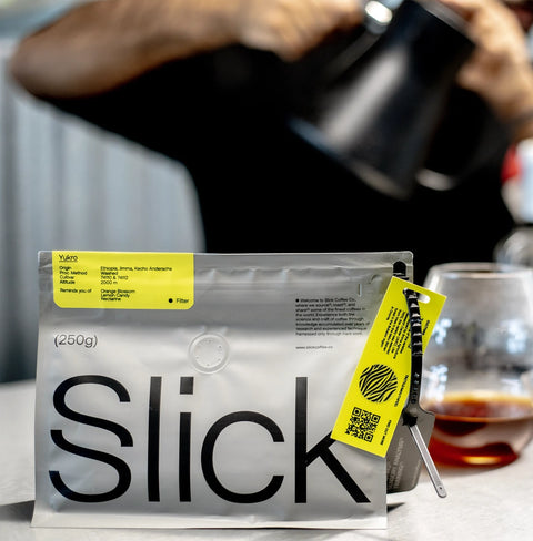 Pack of Slick Coffee Co. Yukro – washed Ethiopian filter coffee with notes of orange blossom, lemon candy, and nectarine.