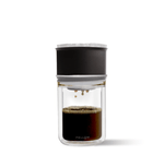FELLOW Stagg [X] Pour-Over Set with flat-bottom dripper, no-clog design, 10 oz double-wall tasting cup, and 30 filters for precise brewing.