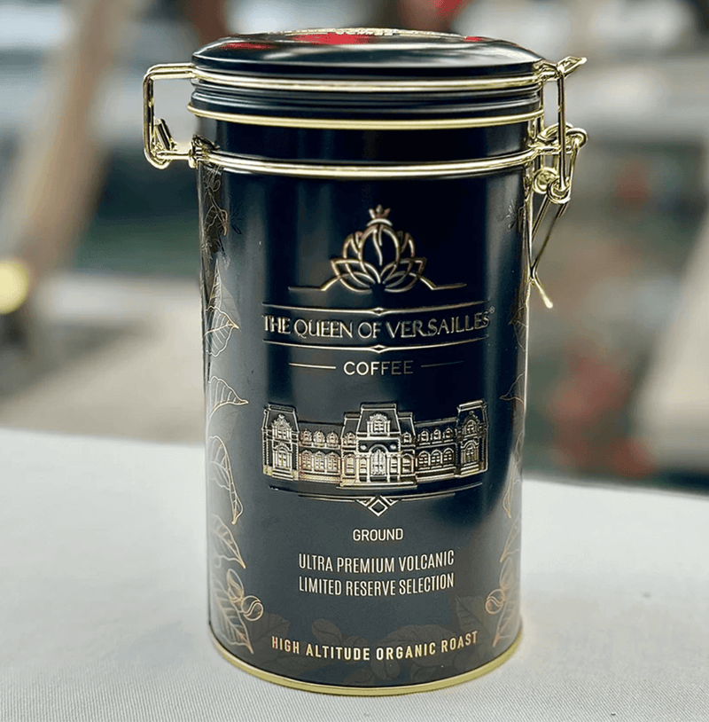 Ultra Premium Volcanic Limited Reserve Espresso can by Queen of Versailles Coffee, high altitude organic roast in elegant packaging.