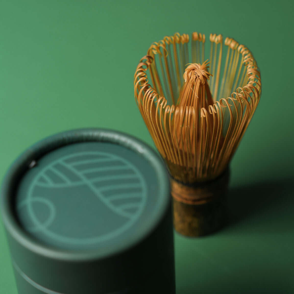 Handmade purple bamboo Matcha whisk with 80 prongs, perfect for thick and thin Matcha tea. Includes travel/storage sleeve.