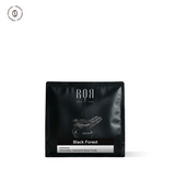 Black Forest coffee bag with chocolate and fruit flavors, offering a rich aromatic experience.