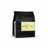 Brazil Vale Dourado specialty coffee packaged in black bag, highlighting its rich flavors and sourced from Brazil.