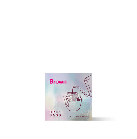 Brown Drip Kit Box by THREE Coffee includes 7 ready-to-brew medium-roast drip bags with caramel, nutty, and chocolate notes. Perfect for travel, office, or easy specialty coffee at home.