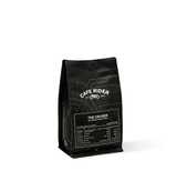 Cafe Rider Roastery's bold Cruiser espresso from Minas de Gerais with muscovado, hazelnut, and dark chocolate flavors, full-bodied brew.