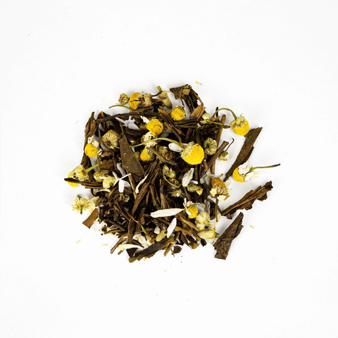 Loose-leaf Chamomile Hojicha blend featuring organic chamomile flowers and roasted tea leaves.