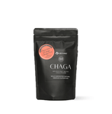 Black packaging of Chocolate Orange Chaga Tea powder, highlighting its adaptogenic benefits and rich flavor.