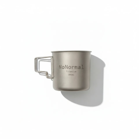 NoNormal 380ml titanium camping cup with foldable handles