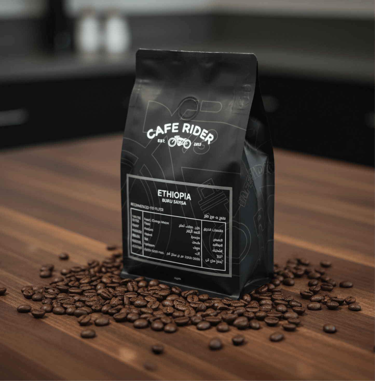 Ethiopia Buku Sayisa coffee bag surrounded by coffee beans on wooden surface, highlighting premium organic Ethiopian heirloom coffee.