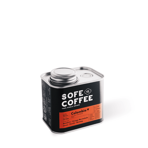 Sofe Premium Coffee Beans tin featuring Colombian beans with a hint of mandarin, showcasing a vibrant, aromatic blend.