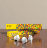 Colombia - Coffee Capsules with vibrant packaging and coffee pods showcasing premium Colombian coffee.