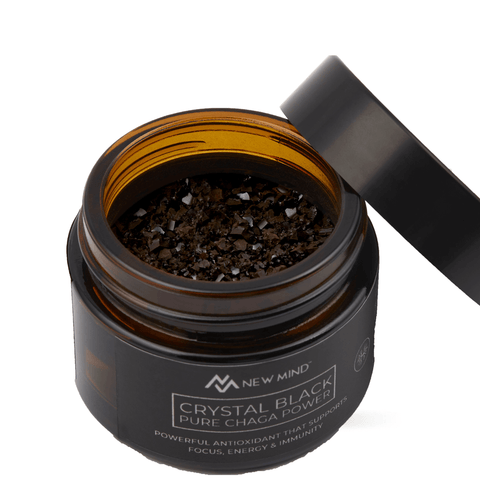 Crystal Black Chaga Extract in a jar, showcasing pure Chaga powder for health benefits and focus.