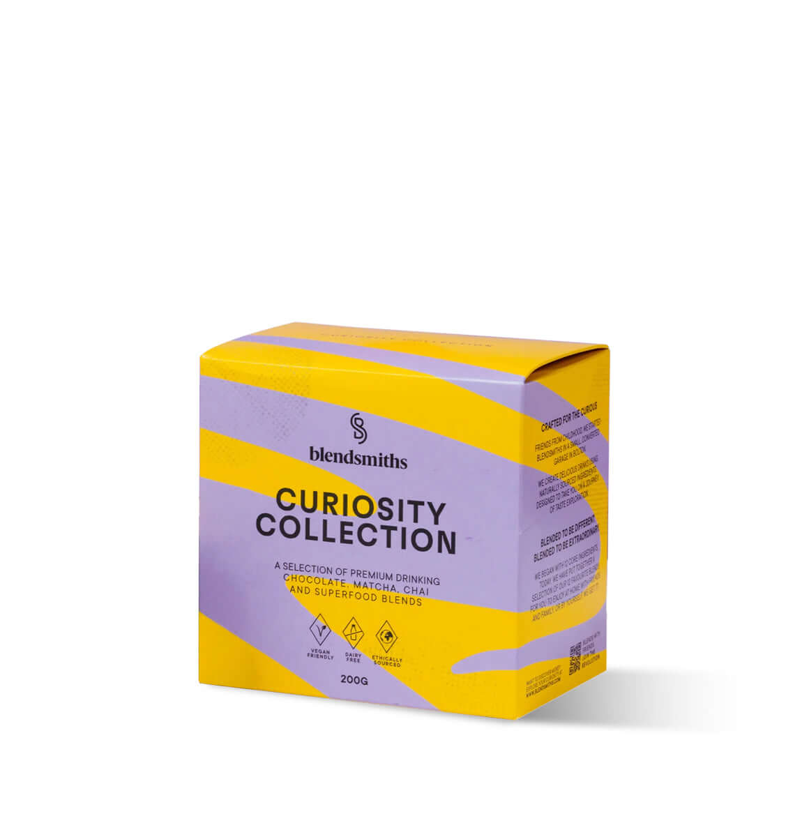 A vibrant display of Blendsmiths' Curiosity Collection, a selection of premium drinking chocolate, matcha chai, and superfood blends. A hand is holding a Japanese Matcha Blend sachet, while a stack of other flavored sachets, including Original Choc Blend,