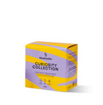 A vibrant display of Blendsmiths' Curiosity Collection, a selection of premium drinking chocolate, matcha chai, and superfood blends. A hand is holding a Japanese Matcha Blend sachet, while a stack of other flavored sachets, including Original Choc Blend,