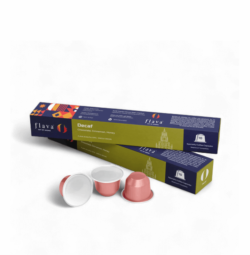 Colombian Decaf Specialty Coffee Capsules with box and single-serve pods offering rich flavor without caffeine.