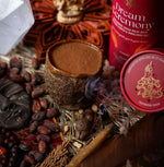 Dream Ceremony ceremonial cacao brew packaging with Cayenne Pepper & Himalayan Salt, featuring a bold red design with celestial gold accents.
