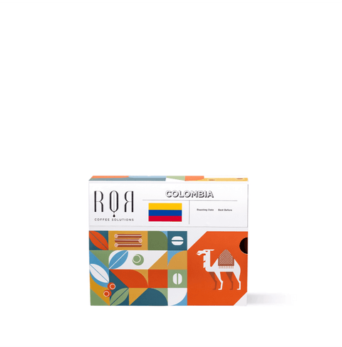 Colorful packaging of Drip Bag Box - Colombia with camel and geometric designs, offering smooth Colombian coffee.