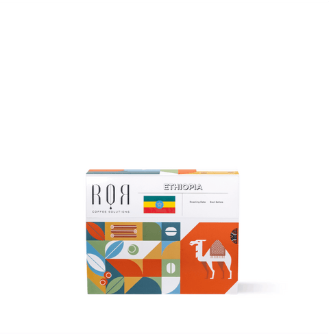 Colorful box of Drip Bag Box - Ethiopia coffee with vibrant patterns and Ethiopian flag, showcasing premium coffee origins.