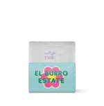 Panama El Burro Geisha Natural by Three Coffee in elegant packaging, grown at 1700–1950 masl by the Lamastus Family on Volcán Barú slopes, with jasmine, mango & bergamot notes in a rich, honey-like body.