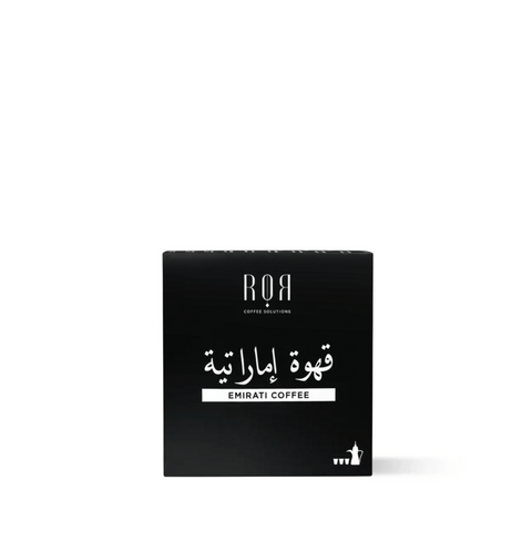 Packaging of Emirati drip coffee with cardamom flavor, featuring a cultural blend of Arabica beans in a black box.