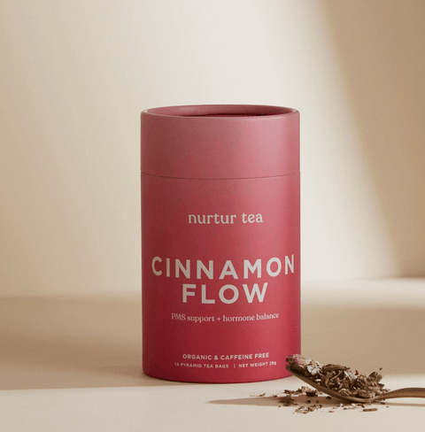 Nurtur Cinnamon Flow Tea is a herbal blend with cinnamon, red clover, and chaste berry, crafted to ease PMS symptoms, support hormonal balance, and promote daily wellbeing.