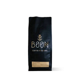 Full & Wild medium roast coffee by Boon Coffee Roasters, made from Ethiopian heirloom beans with natural processing, delivers creamy texture and rich depth in every cup.