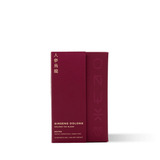 Oolong tea from Fujian, China, hand-rolled and infused with ginseng powder, offering a rich, lingering sweetness in the cup.