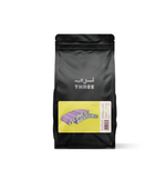 Kenya Gondo AA by Three Coffee in premium specialty coffee bag, double-washed and grown at 1900 masl for citrus, peach, and plum notes, offering clarity, juicy texture, and a syrupy, sugarcane finish.