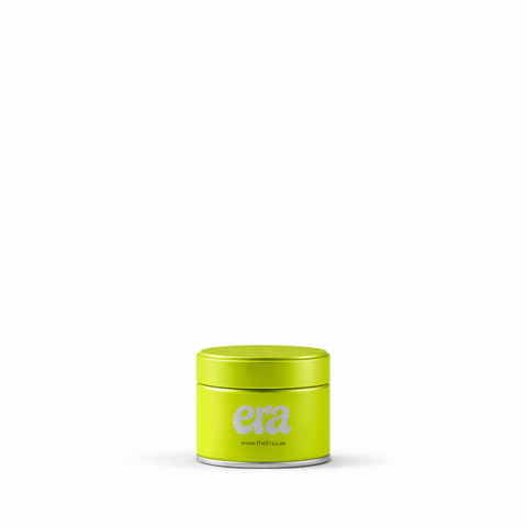 Hojicha - Uji, Kyoto tea package in a bright yellow container, showcasing premium roasted tea.
