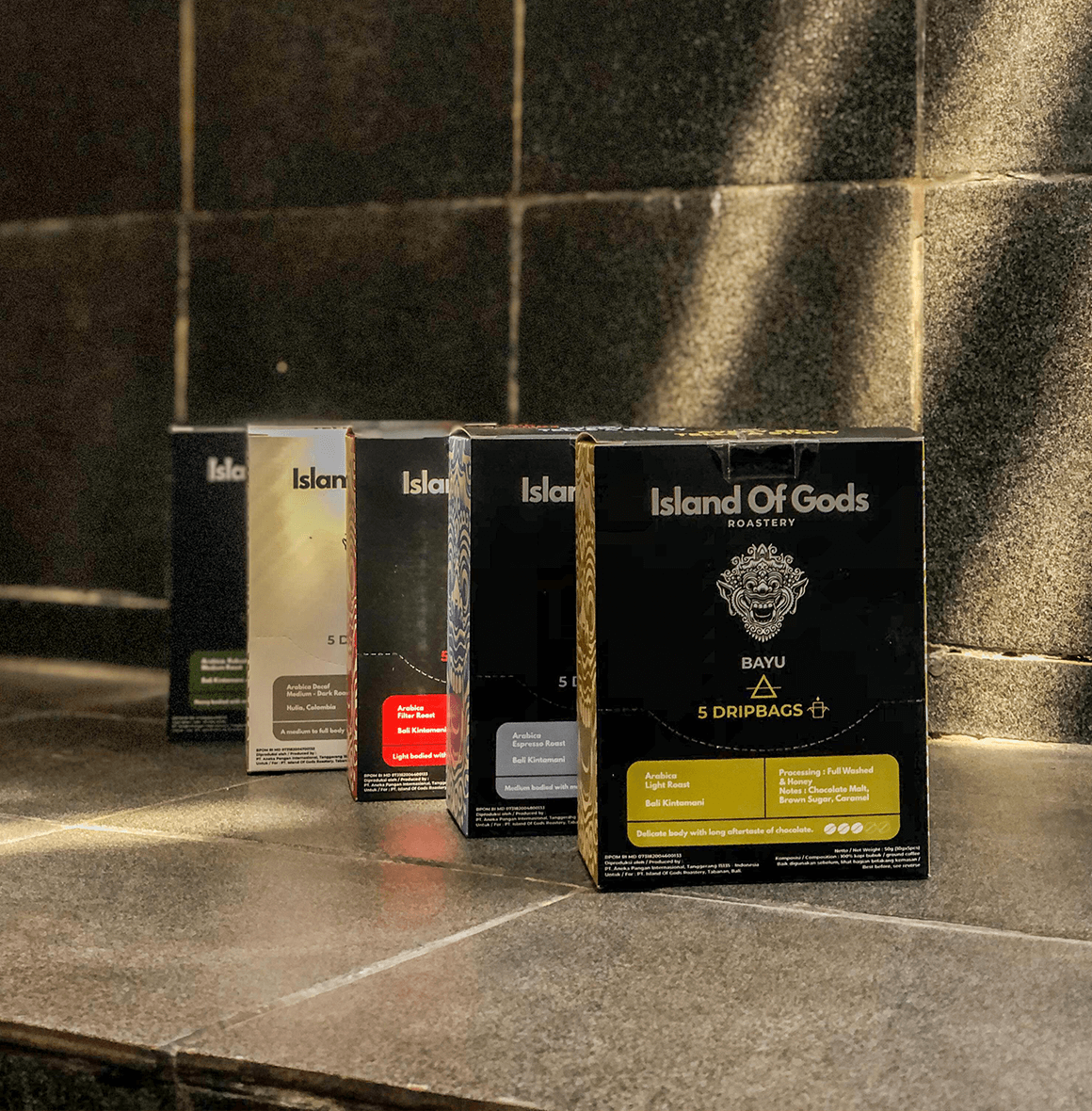 Island of Gods drip bags displayed, featuring vibrant packaging for flavorful coffee blends.