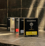 Island of Gods drip bags displayed, featuring vibrant packaging for flavorful coffee blends.
