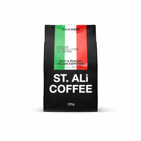 Italo Disco Italian Espresso Blend packaging featuring vibrant Italian flag design and bold text.