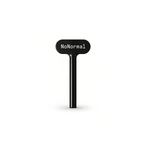 Black NoNormal Tube Squeeze Key, compact reusable tube squeezer for extracting remaining contents from squeeze tubes