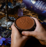 Lucid Dream Mystical Cacao Brew packaging with Blue Lotus & Vanilla, featuring a dark celestial design with gold accents.