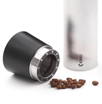 Professional coffee grinder with 47mm Black-Fusion conical burrs, smooth ball-bearing mechanism, stainless steel catch-cup, magnetic funnel, and EVA travel case for on-the-go brewing.