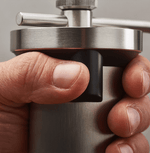 Professional coffee grinder with 47mm Black-Fusion conical burrs, smooth ball-bearing mechanism, stainless steel catch-cup, magnetic funnel, and EVA travel case for on-the-go brewing.