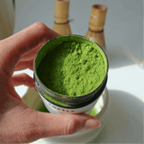 Matcha Starter Kit featuring ceremonial matcha powder in a jar ready for tea preparation.