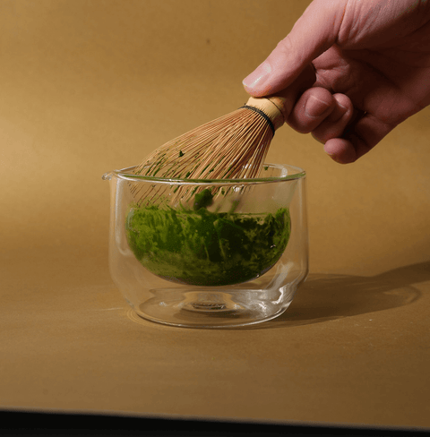 Hand-blown glass mug for whisking, sipping, and serving. Sleek, versatile, and comfortable design for daily use.