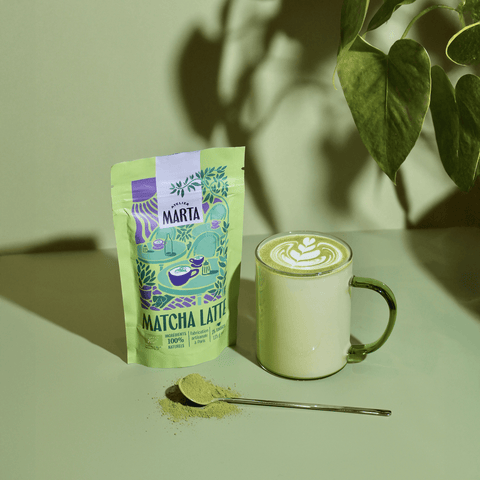Organic Matcha Latte by Atelier Marta, featuring latte powder, cup, and matcha spoon.