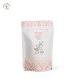 Peach Kissed premium Ceylon black tea package with peach flavor, organic tea blend.