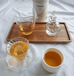 Clarity Master Amber Oolong tea from Alishan, Taiwan, with notes of spring honey, roasted wood, and maple-like sweetness, low in caffeine and sugar-free.