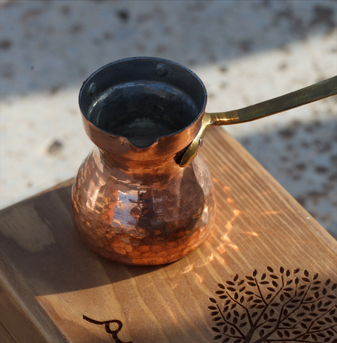 Ben Rahim Cezwe Coffee Pot, hand-formed in Tunisia from tin-lined copper, designed for smooth, rich Turkish coffee extraction with ergonomic handle for easy pouring.