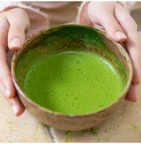Golden Grade Matcha vibrant Uji usucha in a handcrafted bowl, deep green, smooth, rich umami, stone-ground premium tea