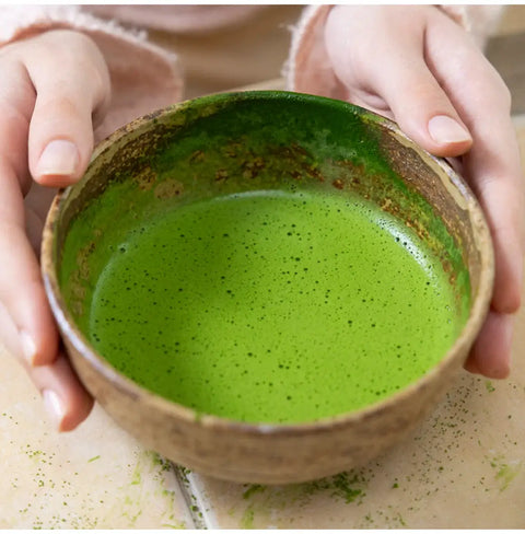 Golden Grade Matcha vibrant Uji usucha in a handcrafted bowl, deep green, smooth, rich umami, stone-ground premium tea
