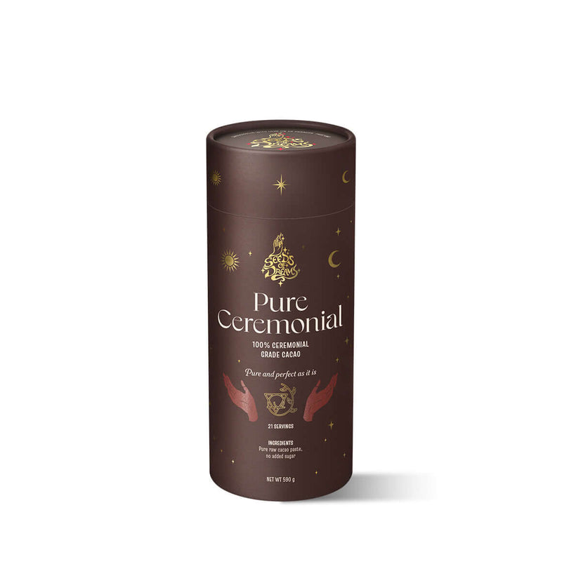 Pure Ceremonial cacao packaging with a rich brown design, featuring celestial gold details and spiritual hand illustrations.