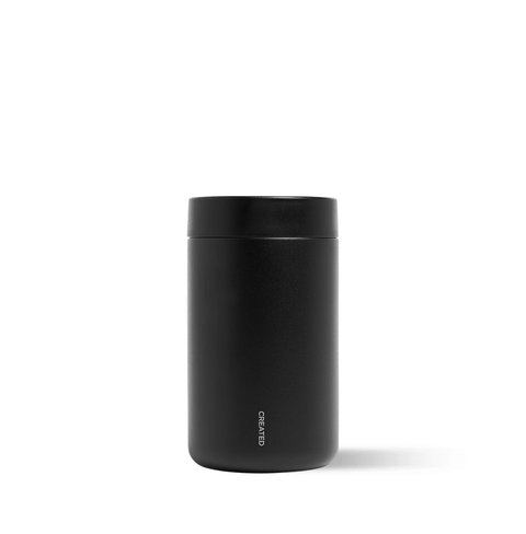 Reserve Vacuum Coffee Canister in sleek black stainless steel design, perfect for keeping coffee fresh.