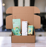 Sage Gift Set showcasing a wellness collection including Nomad Flip Sage, Digest Ease, Mint Cocoa Blend in a gift box.