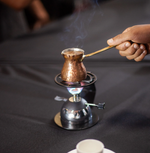 Ben Rahim Cezwe Coffee Stand, made from chromed metal, provides stable support and elegant style for your Turkish coffee setup. Durable, easy to clean, and perfect for daily use.