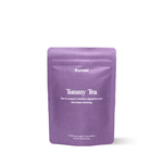 Tummy Tea with chamomile, lemon balm, peppermint, and fennel—an organic herbal blend designed to soothe digestive discomfort and promote gastrointestinal health for a gentle, natural remedy.