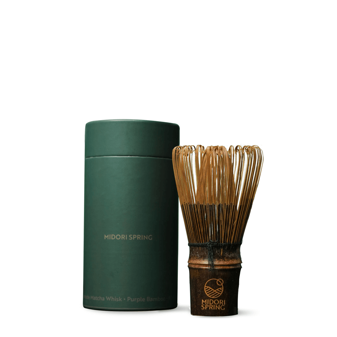 Handmade purple bamboo Matcha whisk with 80 prongs, perfect for thick and thin Matcha tea. Includes travel/storage sleeve.